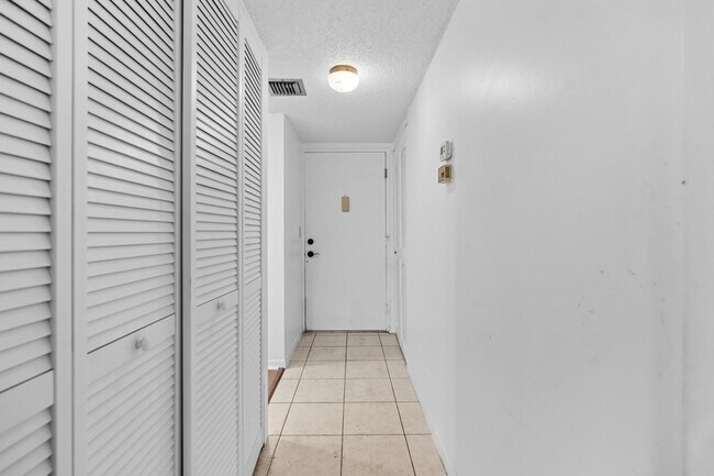 Building Photo - 6075 N Sabal Palm Blvd