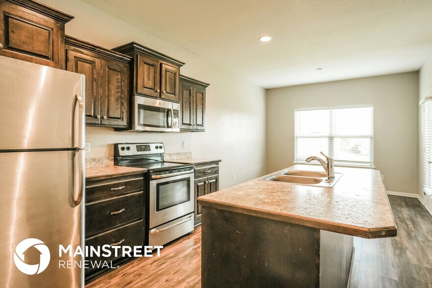 Building Photo - 203 NE Katie Ct