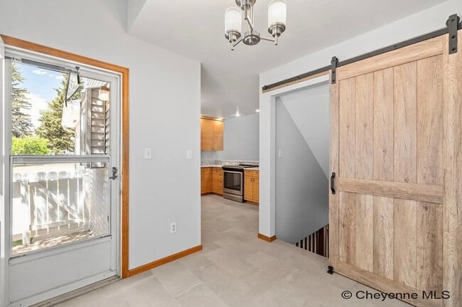 Building Photo - 3 BEDROOM, 2 BATHROOM TOWNHOME WITH 1 CAR ...