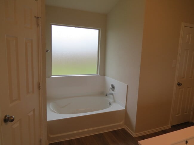 Building Photo - "Charming 3-Bedroom Home with Elegant Gran...