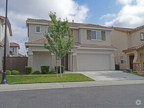 Building Photo - Lovely 4BD/3BA, 1,500 Sq. Ft. Home in Gate...