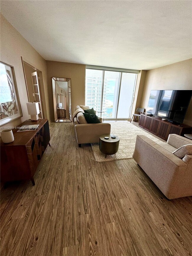 Building Photo - 10275 Collins Ave