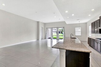 Building Photo - $3,995 Modern 4 Bedroom 3 Bath Gated House in Nocatee. Bonus Office. Amenities. Loft. Pet Friendl...