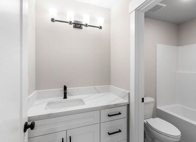 Building Photo - Beautiful New Construction 4-Bedroom Home with a Main-Level Bedroom, Designer Finishes, Attached ...