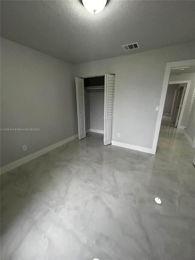 Building Photo - 6091 NW 29th Ave