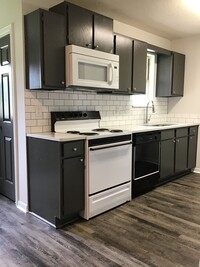 1 bedroom kitchen - Athens Square Apartments