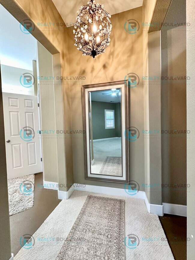 Building Photo - Open Kitchen, Expansive Living, and Covered Patio in Tranquil South Reno Near Trails, Parks & Sho...