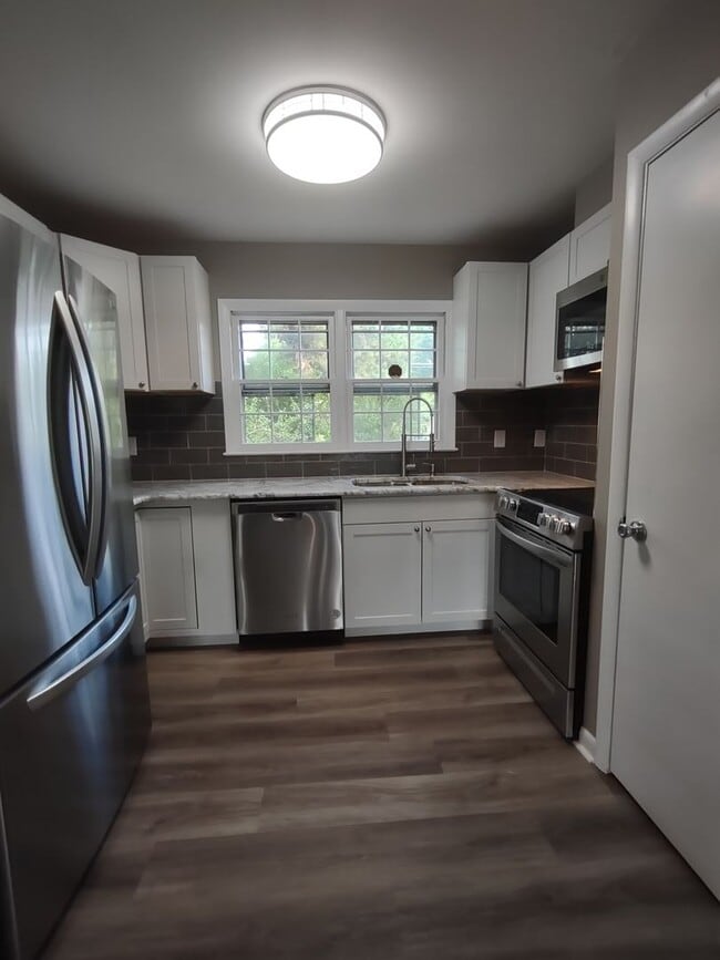 Building Photo - Newly Renovated Condo located in "Coventry...