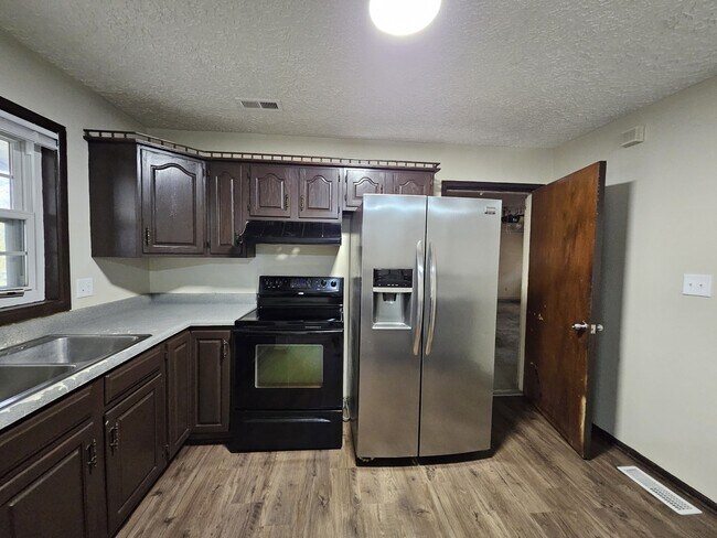 Building Photo - 3403 N Hartman Dr