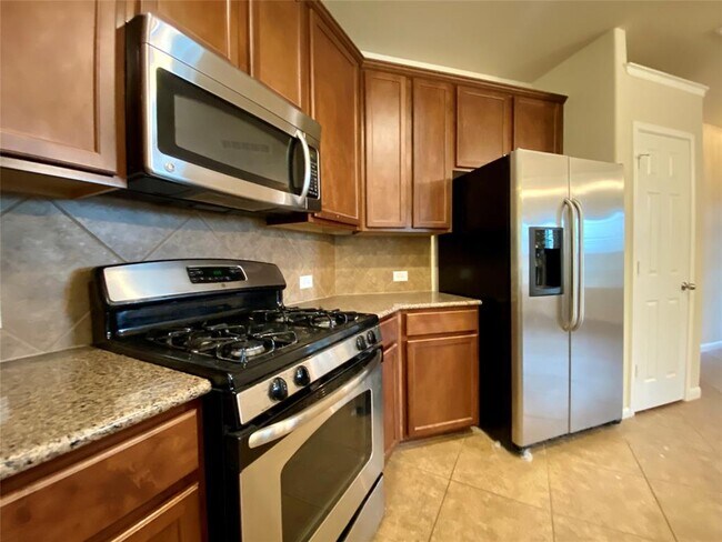 Building Photo - 1310 W Parmer Ln