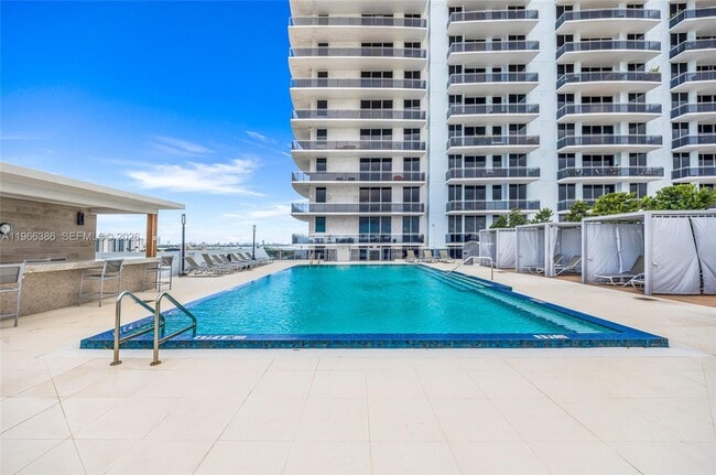 Building Photo - 7901 Hispanola Ave