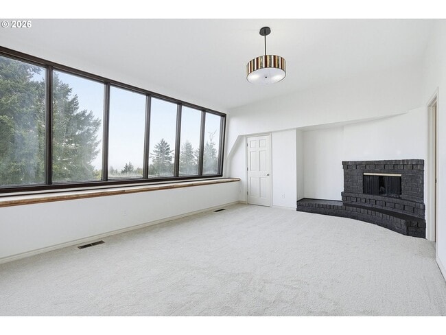 Building Photo - One-of-a-Kind 5BR Home with Floor-to-Ceiling Windows, Wraparound Decks & Breathtaking Treeline Views