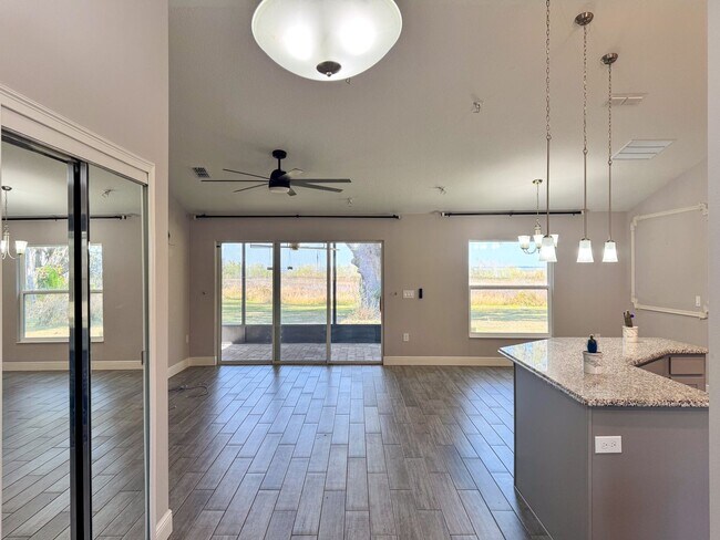 Building Photo - LAKE FRONT BRAND NEW Beautiful 3 bedroom on Lake Toho!