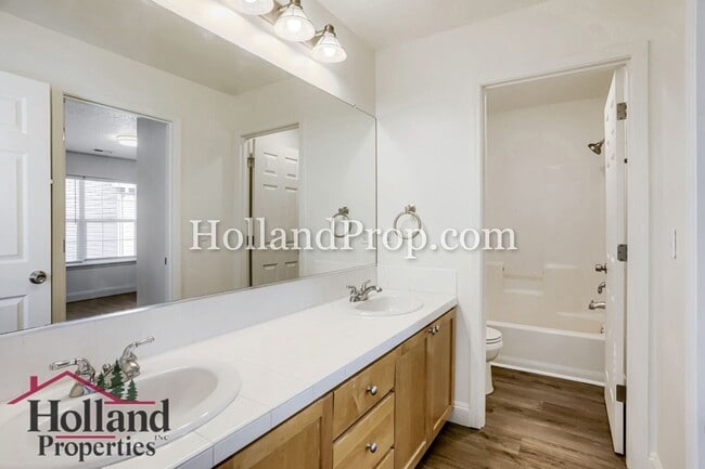 Building Photo - Charming 3-Bedroom Home with Wood Floors, Gas Fireplace & Private Patio