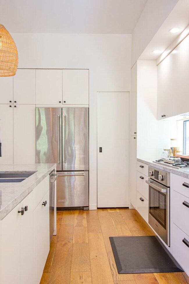 Building Photo - Spacious 4BR/3BA Westchester Home with Private Backyard, BBQ & Security System
