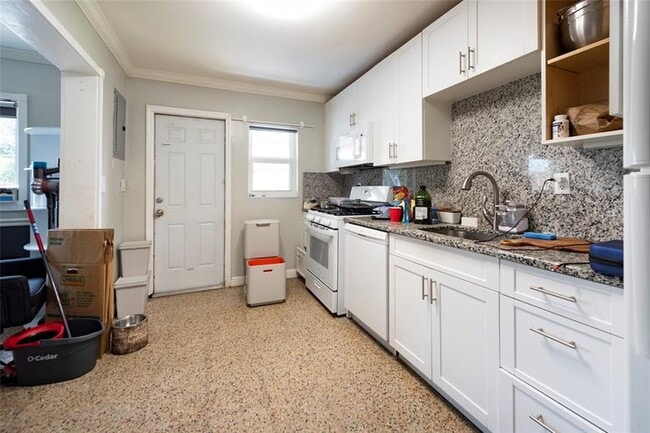 Building Photo - 5448 NE 3rd Ter.