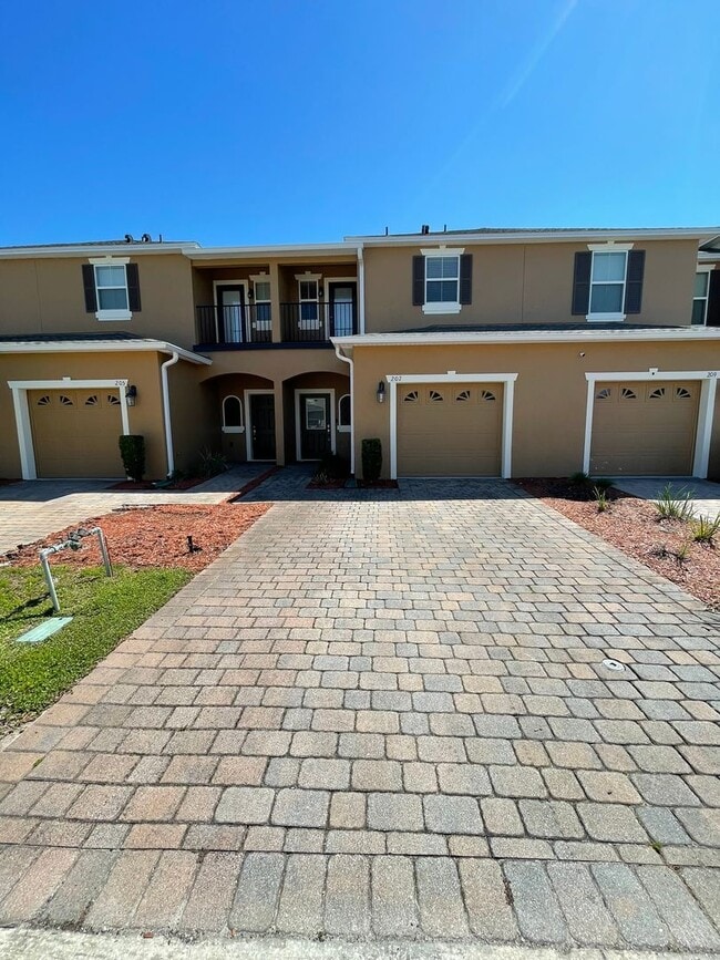 Building Photo - 2 Bedroom, 2.5 Bathroom Townhome in Grande Champions