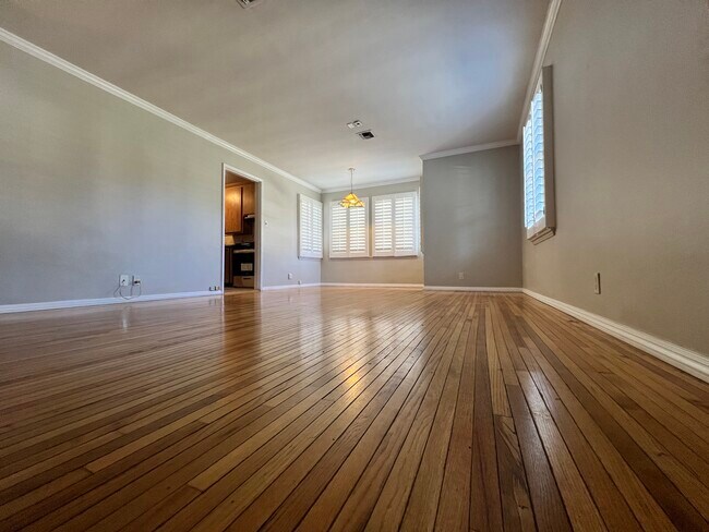 Living room with thin slat oak floors - 14340 Hatteras St