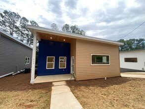 Building Photo - NEW CONSTRUCTION 5 BEDROOM PRE-LEASING FOR...