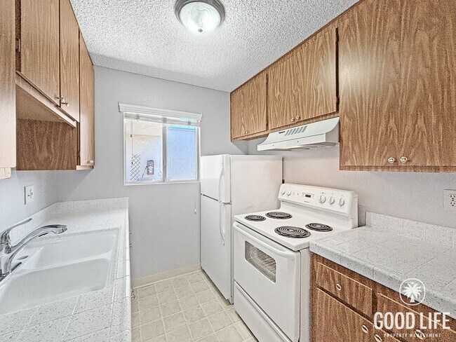 Building Photo - Comfortable 1BD/1BA Upper-Level Condo in North Park with Reserved Parking & On-Site Laundry
