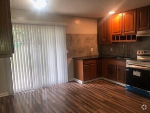 Building Photo - ALL NEW INSIDE!!!-Two Bedroom Duplex with ...