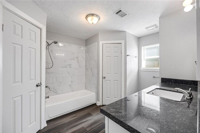 Building Photo - Welcome to this fully remodeled 4/2/2 brick home near Lake Conroe! With new AC/heat, roof, water ...