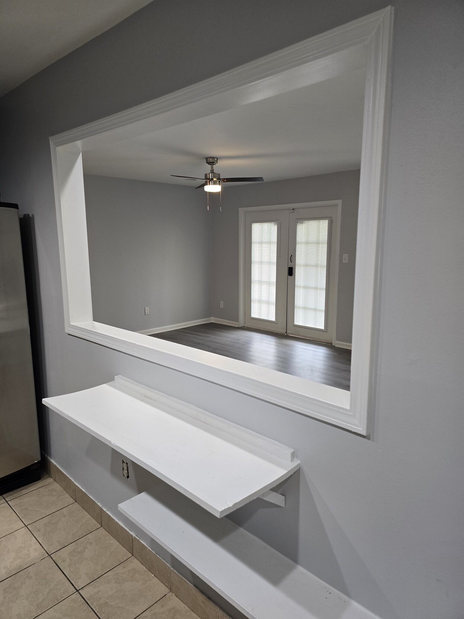 View of living room from kitchen - 7984 Shady Oak Trl