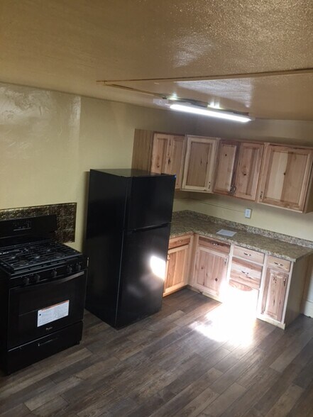 Kitchen view; Brand new fridge and oven. - 846 McKinley St