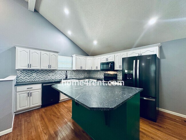 Building Photo - Overland Park Raised Ranch, Primary Suite ...