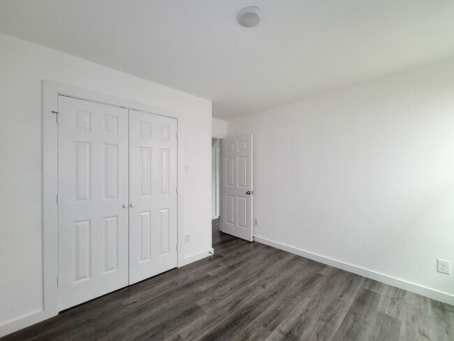 Building Photo - This newly constructed 3-bedroom, 2-bathroom unit offers modern living with 1,150 sq ft of space....