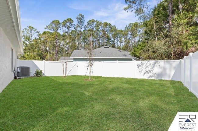 Building Photo - FULLY FENCED, LIKE- NEW 3/2/1 TOWNHOUSE ON A CUL DE SAC IN BEAUTIFUL SEMINOLE WOODS