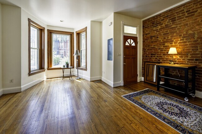 Building Photo - Historic & Charming 3BR Rowhouse near Howard is Move-in Ready!