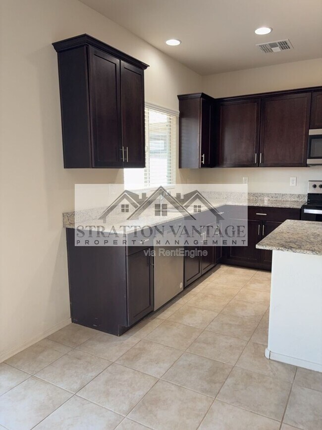 Building Photo - 43620 W Mescal Dr