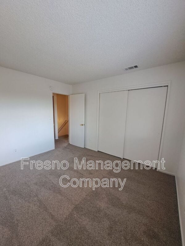 Building Photo - 4765 N Cedar Ave