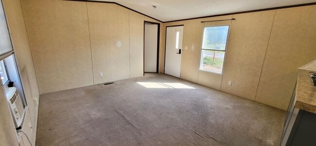 Building Photo - 2/1 single wide outside city limits