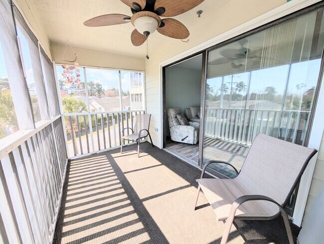 Building Photo - Dreamy Little River Condo — Furnished, Elevator Access, Pool & Marina Nearby!