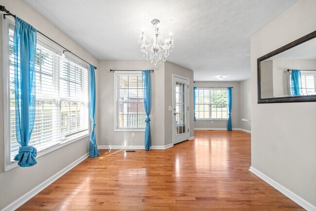 Building Photo - Pet Friendly Three Bedroom with Bonus!