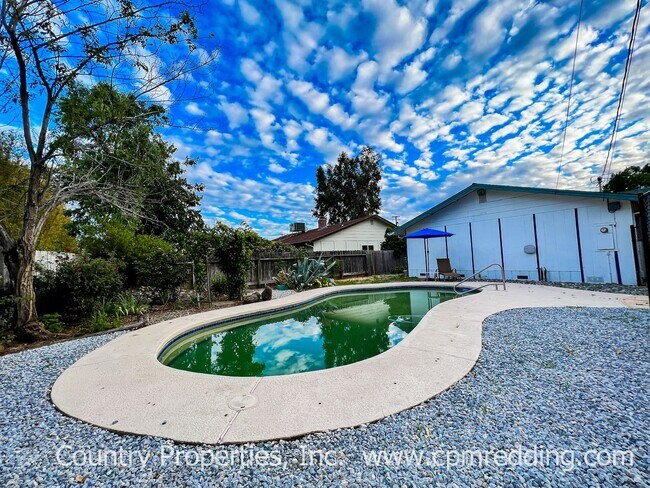 Building Photo - Spacious 3-Bedroom House with Gated Pool in Panorama Heights Coming Available Soon!