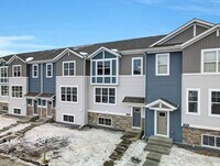 Building Photo - Available now is an almost new, charming 3...