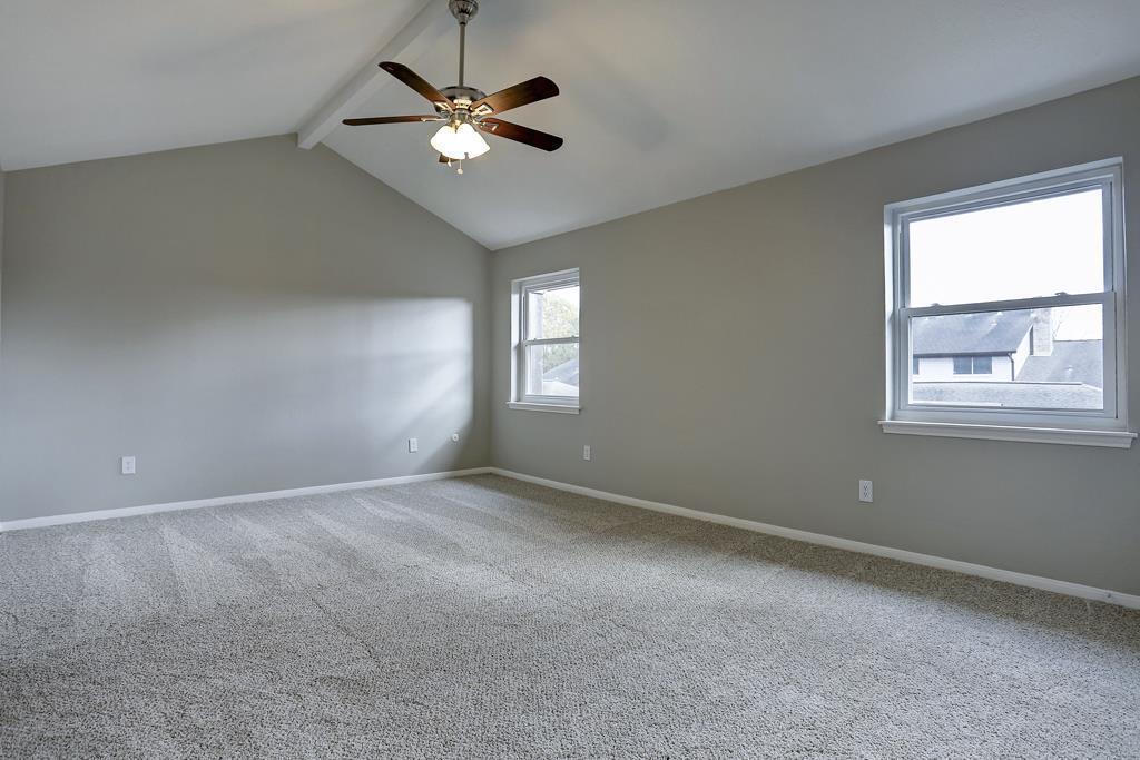 Huge primary bedroom w/ vaulted ceilings and his/her walk-in closets - 11744 S Kirkwood Rd