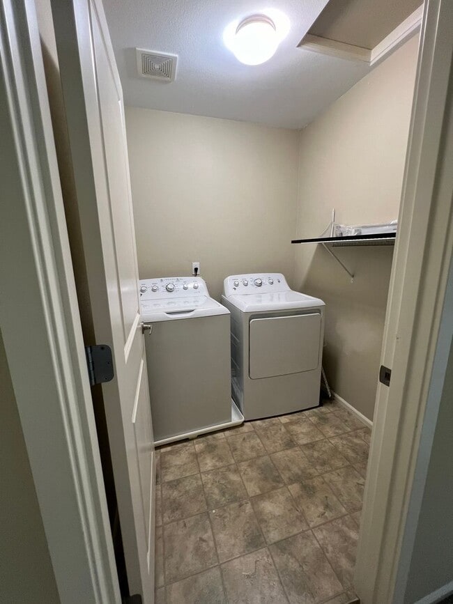 Building Photo - Spacious 4 Bedroom Home with Zen Backyard and 3-Car Garage