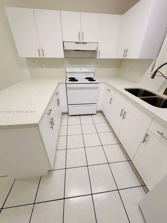 Building Photo - 6395 W 22nd Ct