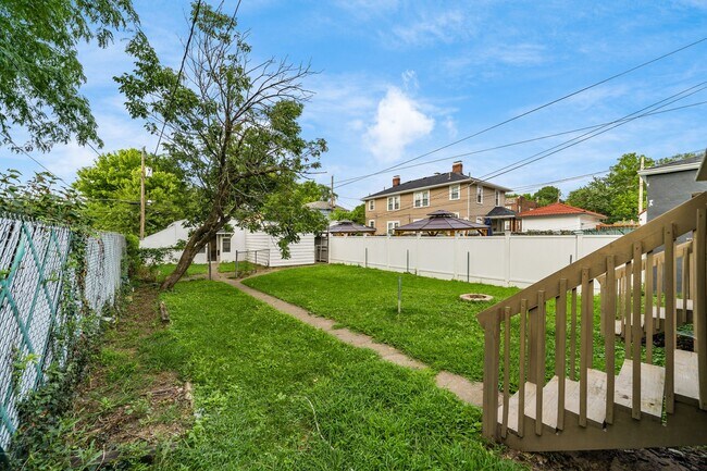 Yard with Privacy fence - 144 E Tompkins St