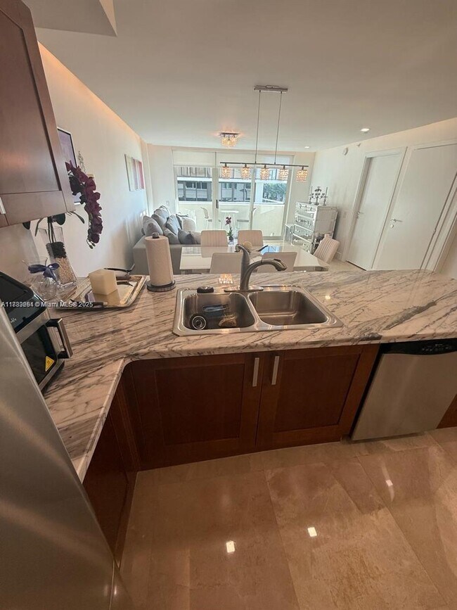 Building Photo - 9499 Collins Ave