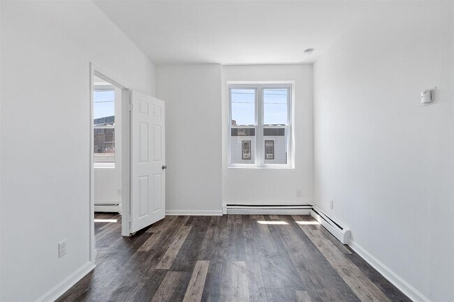 Building Photo - 310 Paterson Plank Rd