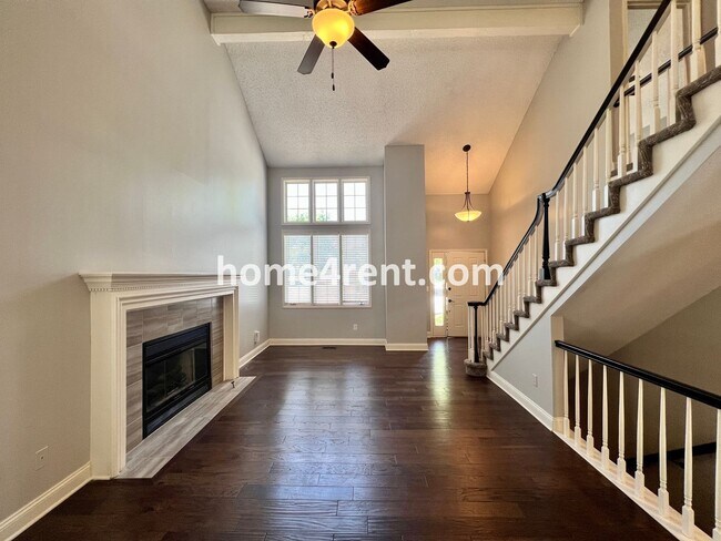 Building Photo - Maintenance Free Living w/ Hardwood Floors, Open Layout, Granite Counters, Finished Basement!