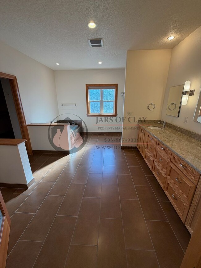 Building Photo - Custom Built Home with Lots of Unique Amenities- Workshop Area Plus 2 Car Garage!