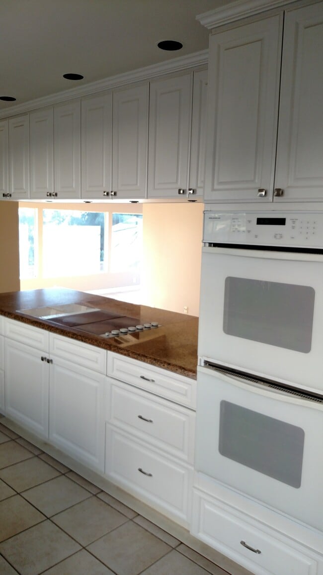 Cooktop view to Upper & Step down den areas - 5835 Tellefson Rd
