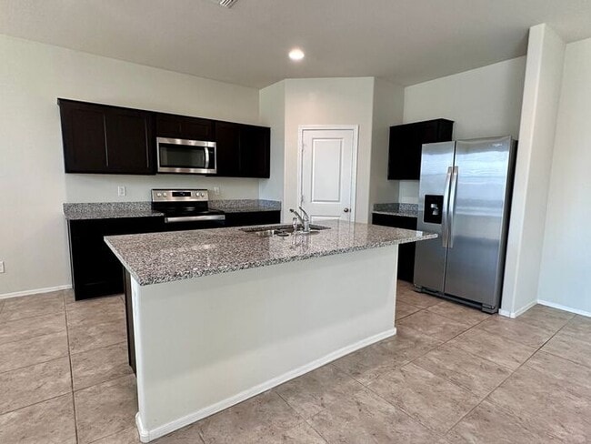Building Photo - Large Backyard with this 4-bedroom, 2-bath...
