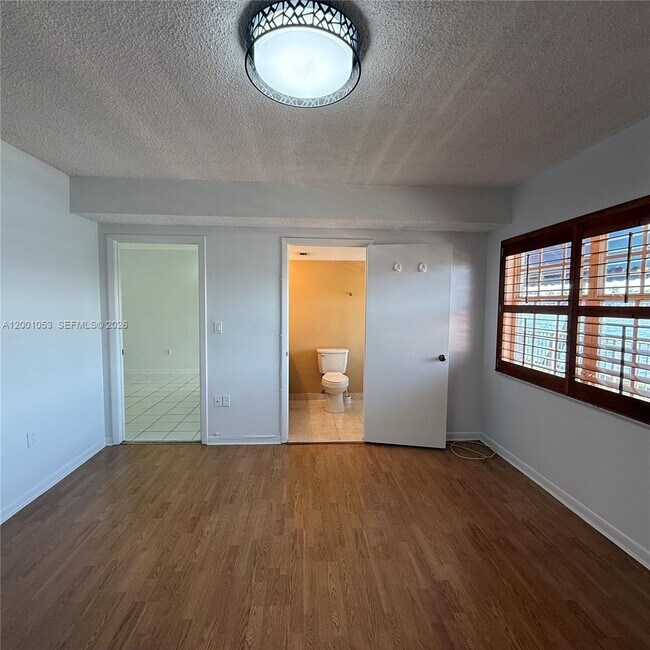 Building Photo - 6980 NW 173rd Dr